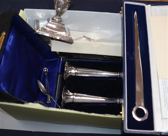 A cased pair of silver spill vases(a.f.),a dwarf candlestick, paperknife and minor flatware.